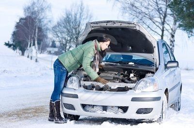 winter-car-breakdown-woman-repair-motor-caucasian-pixmac-image-69217617.jpg