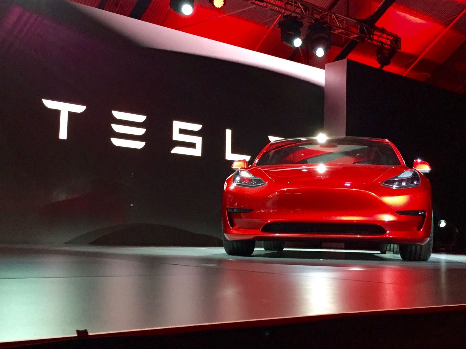 Tesla-logo-badge-red-Model-3.jpg