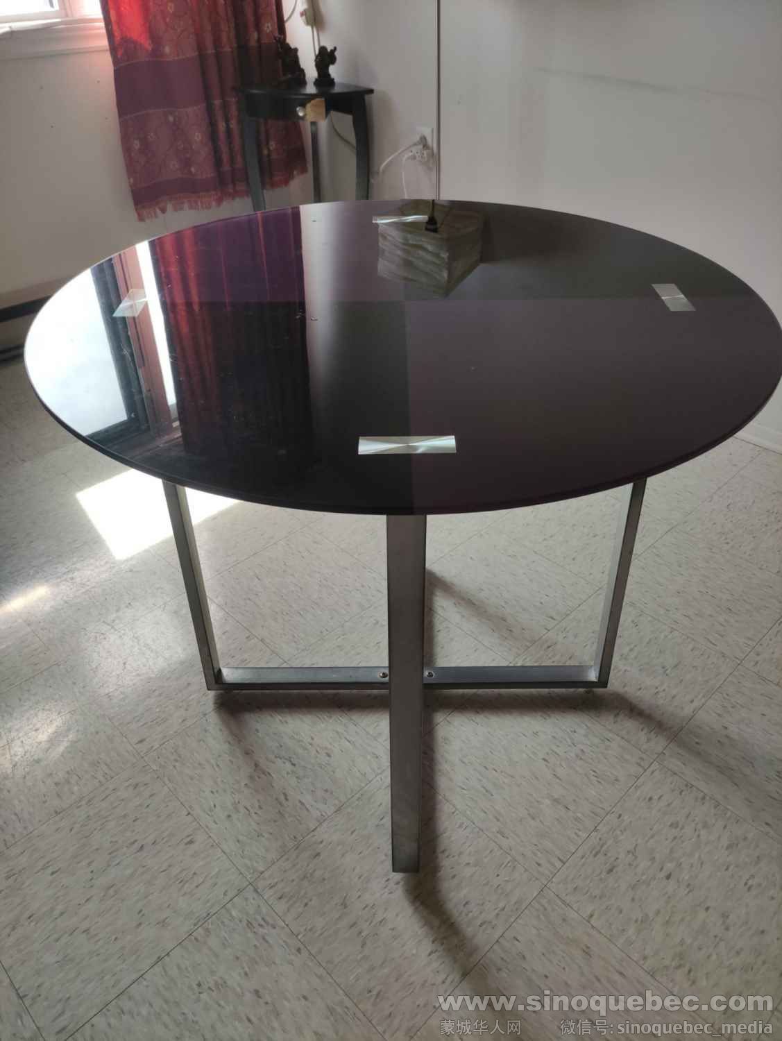 round glass dining table.jpg